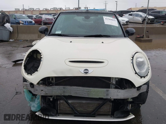 2016 MINI Convertible S z VIN WMWWG9C52G3C21934, wystawiony jako IAAI lot #41569029 z przebiegiem 102 042 mil mil oraz . Historia ofert i sprzedaży dostępna na DreamBid. Obrazek 13.