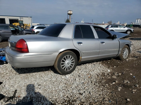 2010 Mercury Grand Marquis LS z VIN 2MEBM7FV4AX636897, wystawiony jako Copart lot #53387985 z przebiegiem Nie podano mil oraz Szkody całkowita. Historia ofert i sprzedaży dostępna na DreamBid. Obrazek 3.
