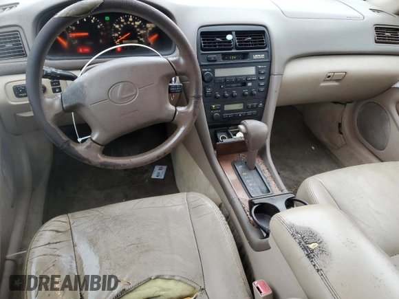1999 Lexus ES 300 Luxury Sport Sdn with VIN JT8BF28GXX5067205, listed as a Copart auction lot 83018394 with 170,573 mi miles and Salvage Title. Bid and sale history available at carsss.com. Image 8.