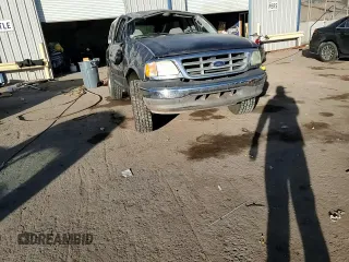 2003 Ford F-150 XL with VIN 1FTRF072X3KC94240, listed as a Copart auction lot 86130954 with 101,042 mi miles and Salvage title. Bid and sale history available at DreamBid. Image 11.