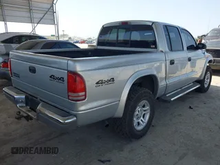 2002 Dodge Dakota SLT with VIN 1B7HG48N62S546119, listed as a IAAI auction lot 41826998 with 157,761 mi miles. Bid and sale history available at carsss.com. Image 4.