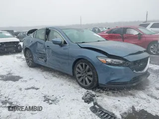 2018 Mazda 6 Grand Touring with VIN JM1GL1TY5J1330614, listed as a IAAI auction lot 41354444 with 100,744 mi miles and . Bid and sale history available at DreamBid. Image 1.