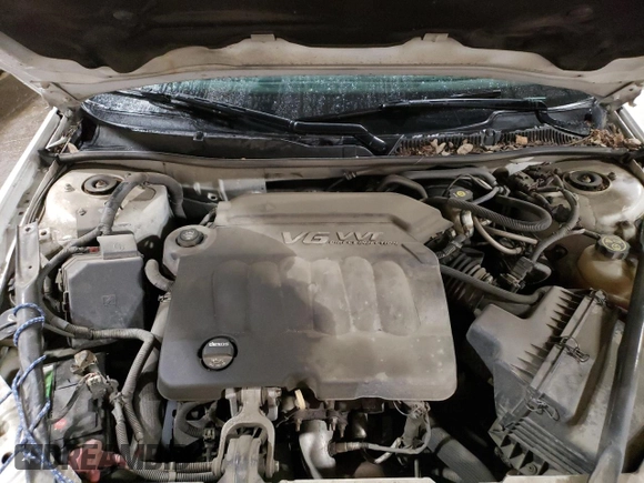2014 Chevrolet Impala LT with VIN 2G1WB5E37E1100847, listed as a Copart auction lot 58580765 with 104,949 mi miles and Salvage title. Bid and sale history available at DreamBid. Image 11.