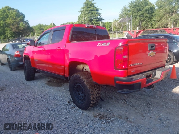 2020 Chevrolet Colorado 4WD Z71 with VIN 1GCGTDEN6L1215253, listed as a IAAI auction lot 42343032 with 61,632 mi miles and . Bid and sale history available at DreamBid. Image 3.