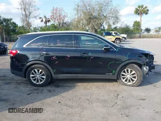 2016 Kia Sorento LX with VIN 5XYPGDA56GG029499, listed as a IAAI auction lot 41512850 with 179,971 mi miles. Bid and sale history available at carsss.com. Image 14.
