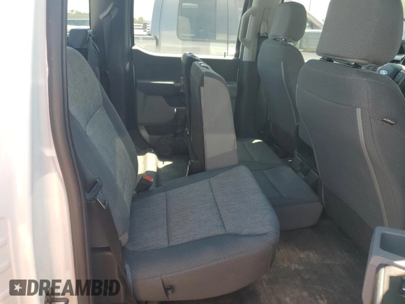 2023 Ford F-150 XL with VIN 1FTFW1E89PKD98613, listed as a Copart auction lot 61860785 with 25,568 mi miles and Salvage title. Bid and sale history available at DreamBid. Image 11.