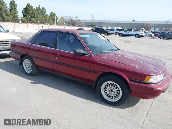 1991 Toyota Camry z VIN JT2SV21E0M3462782, wystawiony jako IAAI lot #41841451 z przebiegiem 214 611 mil mil oraz . Historia ofert i sprzedaży dostępna na DreamBid. Obrazek 1.
