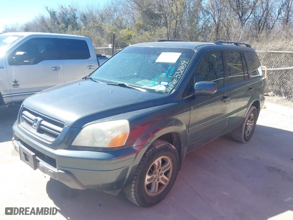 2004 Honda Pilot EX with VIN 2HKYF18574H532409, listed as a IAAI auction lot 41701760 with 302,949 mi miles. Bid and sale history available at carsss.com. Image 2.