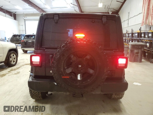 2022 Jeep Wrangler Unlimited Sport with VIN 1C4HJXDG4NW206622, listed as a Copart auction lot 87664525 with 62,240 mi miles and Salvage Title. Bid and sale history available at DreamBid. Image 6.