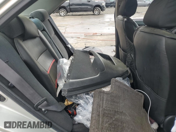2004 Toyota Camry LE z VIN JTDBE32K940297754, wystawiony jako Copart lot #55809155 z przebiegiem 232 092 mil mil oraz Szkoda całkowita • Salvage title. Historia ofert i sprzedaży dostępna na DreamBid. Obrazek 10.