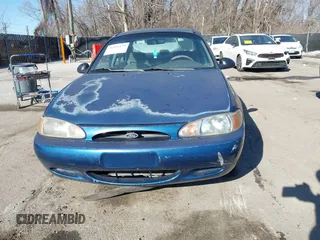 1998 Ford Escort SE with VIN 1FAFP13P4WW288248, listed as a IAAI auction lot 41456179 with 223,155 mi miles. Bid and sale history available at carsss.com. Image 6.