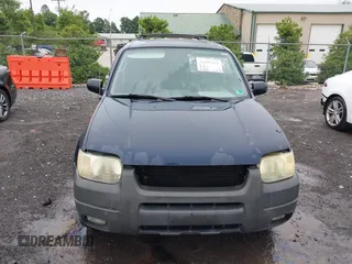 2003 Ford Escape XLT Popular 2 with VIN 1FMYU93183KD19909, listed as a IAAI auction lot 42518631 with 182,933 mi miles and . Bid and sale history available at DreamBid. Image 12.