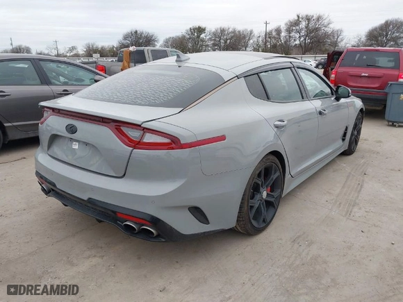 2018 Kia Stinger GT2 with VIN KNAE55LC6J6015897, listed as a IAAI auction lot 41334513 with 126,349 mi miles. Bid and sale history available at carsss.com. Image 4.