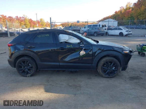 2023 Mazda CX-30 2.5 S Premium Package with VIN 3MVDMBDM5PM536219, listed as a IAAI auction lot 40710444 with 16,863 mi miles. Bid and sale history available at carsss.com. Image 12.