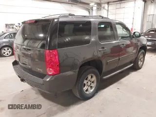 2010 GMC Yukon SLT with VIN 1GKUKCE08AR148548, listed as a IAAI auction lot 41994933 with 248,534 mi miles. Bid and sale history available at carsss.com. Image 4.