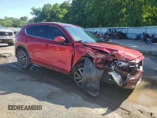 2018 Mazda CX-5 Grand Touring with VIN JM3KFADM9J0398036, listed as a Copart auction lot 62284145 with 118,827 mi miles and Salvage title. Bid and sale history available at DreamBid. Image 4.