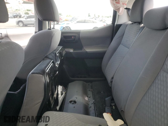 2023 Toyota Tacoma SR z VIN 3TYCZ5ANXPT136237, wystawiony jako Copart lot #62584345 z przebiegiem 32 674 mil mil oraz Szkoda całkowita • Salvage title. Historia ofert i sprzedaży dostępna na DreamBid. Obrazek 10.