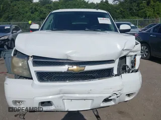 2007 Chevrolet Tahoe LT with VIN 1GNFC13J97R314853, listed as a IAAI auction lot 42684980 with 312,399 mi miles and . Bid and sale history available at DreamBid. Image 12.