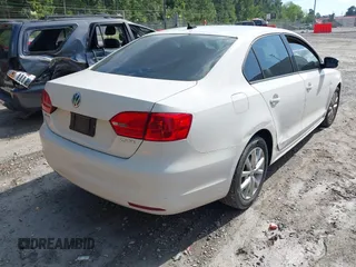 2012 Volkswagen Jetta Sedan SE w/Convenience & Sunroof with VIN 3VWDX7AJ9CM341490, listed as a IAAI auction lot 42147872 with 207,723 mi miles. Bid and sale history available at carsss.com. Image 4.