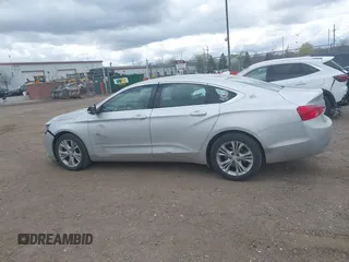 2014 Chevrolet Impala LT with VIN 1G1125S34EU123487, listed as a IAAI auction lot 42088001 with 184,553 mi miles and . Bid and sale history available at DreamBid. Image 14.