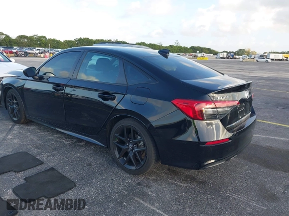 2022 Honda Civic Sport z VIN 2HGFE2F53NH569990, wystawiony jako IAAI lot #41944635 z przebiegiem 20 935 mil mil oraz . Historia ofert i sprzedaży dostępna na DreamBid. Obrazek 3.