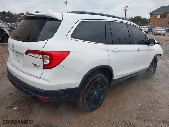 2021 Honda Pilot Special Edition with VIN 5FNYF5H25MB028579, listed as a IAAI auction lot 41559701 with 63,936 mi miles. Bid and sale history available at carsss.com. Image 4.