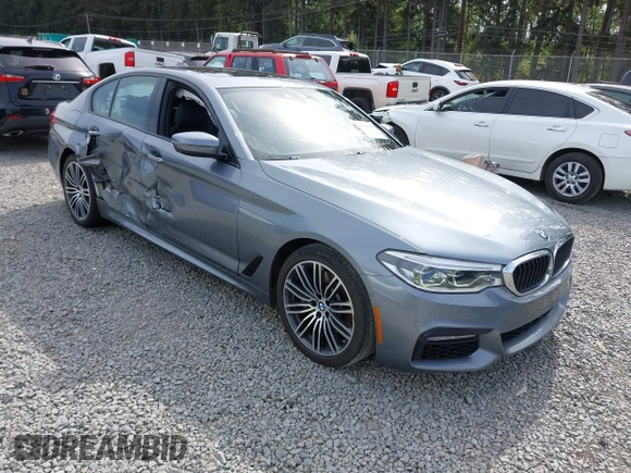 2018 BMW 5 Series 540i z VIN WBAJE5C54JG917877, wystawiony jako IAAI lot #42235433 z przebiegiem 103 375 mil mil oraz . Historia ofert i sprzedaży dostępna na DreamBid. Obrazek 1.
