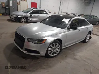 2013 Audi A6 3.0T Prestige with VIN WAUHGAFC9DN099395, listed as a IAAI auction lot 41958743 with 123,000 mi miles. Bid and sale history available at carsss.com. Image 2.