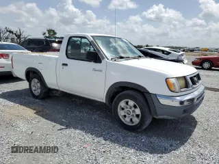 1998 Nissan Frontier XE z VIN 1N6DD21S5WC335549, wystawiony jako Copart lot #61021245 z przebiegiem 310 230 mil mil oraz Czysty tytuł • Clean title. Historia ofert i sprzedaży dostępna na DreamBid. Obrazek 4.