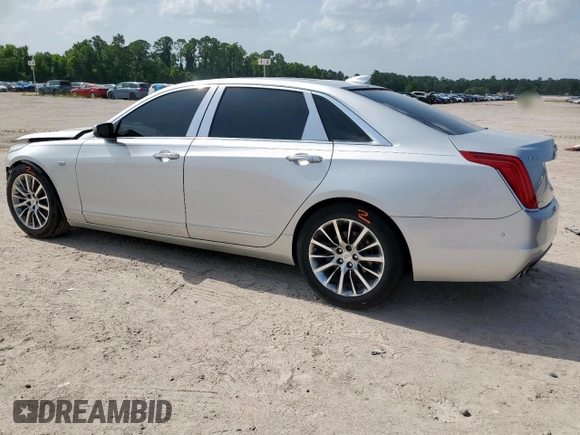 2016 Cadillac CT6 Premium Luxury AWD with VIN 1G6KF5RSXGU153936, listed as a Copart auction lot 63486555 with 95,357 mi miles and Salvage title. Bid and sale history available at DreamBid. Image 2.