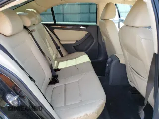 2017 Volkswagen Jetta SEL z VIN 3VWL17AJ6HM404789, wystawiony jako Copart lot #59029645 z przebiegiem 129 788 mil mil oraz Szkoda całkowita • Salvage title. Historia ofert i sprzedaży dostępna na DreamBid. Obrazek 10.