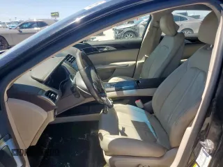 2016 Lincoln MKZ Hybrid z VIN 3LN6L2LU2GR625176, wystawiony jako Copart lot #54044385 z przebiegiem 124 861 mil mil oraz Szkoda całkowita • Salvage title. Historia ofert i sprzedaży dostępna na DreamBid. Obrazek 7.