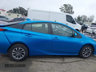 2020 Toyota Prius L Eco z VIN JTDKARFU9L3104395, wystawiony jako IAAI lot #42207156 z przebiegiem 85 572 mil mil oraz . Historia ofert i sprzedaży dostępna na DreamBid. Obrazek 13.