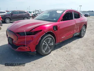 2023 Ford Mustang Mach-E Premium z VIN 3FMTK3R40PMA88565, wystawiony jako IAAI lot #42245792 z przebiegiem 21 394 mil mil oraz . Historia ofert i sprzedaży dostępna na DreamBid. Obrazek 2.