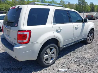 2012 Ford Escape Limited with VIN 1FMCU0EG6CKC75254, listed as a IAAI auction lot 42015879 with 194,601 mi miles. Bid and sale history available at carsss.com. Image 4.