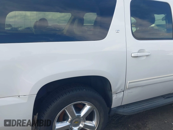 2011 Chevrolet Suburban LT with VIN 1GNSCJE01BR291466, listed as a IAAI auction lot 41800799 with 232,542 mi miles. Bid and sale history available at carsss.com. Image 6.