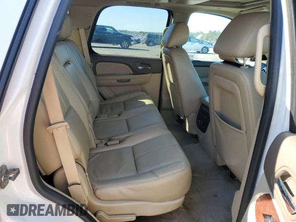 2013 Chevrolet Tahoe LT z VIN 1GNSCBE00DR237312, wystawiony jako Copart lot #48971785 z przebiegiem 211 410 mil mil oraz Szkoda całkowita • Salvage title. Historia ofert i sprzedaży dostępna na DreamBid. Obrazek 11.