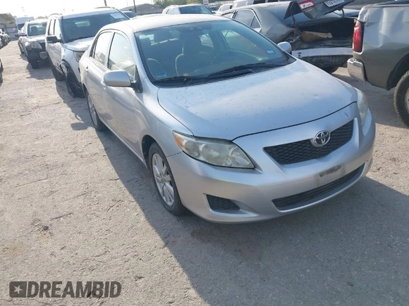 2009 Toyota Corolla with VIN 1NXBU40E59Z078727, listed as a IAAI auction lot 42035739 with 113,814 mi miles. Bid and sale history available at carsss.com. Image 1.
