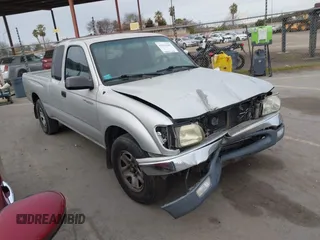 2002 Toyota Tacoma z VIN 5TEVL52N42Z014652, wystawiony jako IAAI lot #41562665 z przebiegiem 233 095 mil mil oraz . Historia ofert i sprzedaży dostępna na DreamBid. Obrazek 1.