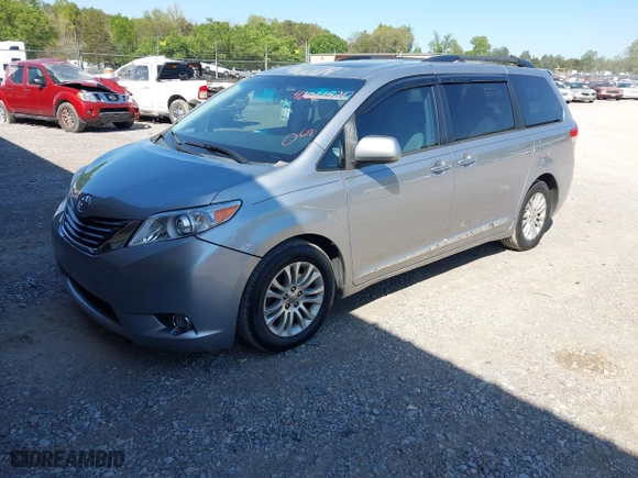 2012 Toyota Sienna XLE AAS with VIN 5TDYK3DC8CS257542, listed as a IAAI auction lot 42061520 with 166,449 mi miles. Bid and sale history available at carsss.com. Image 17.