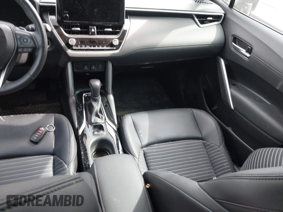 2023 Toyota Corolla Cross Hybrid S with VIN 7MUFBABG1PV005094, listed as a IAAI auction lot 42162727 with Not provided miles and . Bid and sale history available at DreamBid. Image 15.
