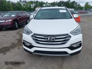 2018 Hyundai Santa Fe 2.4L z VIN 5XYZUDLB1JG543837, wystawiony jako IAAI lot #42235471 z przebiegiem 157 909 mil mil oraz . Historia ofert i sprzedaży dostępna na DreamBid. Obrazek 12.