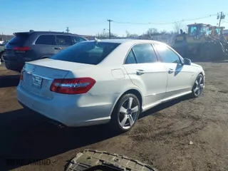 2012 Mercedes-Benz E-Class E 350 Luxury with VIN WDDHF8JB1CA618951, listed as a IAAI auction lot 41651716 with 143,221 mi miles. Bid and sale history available at carsss.com. Image 4.