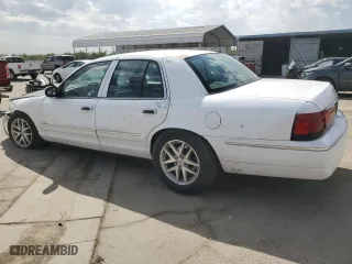 2004 Mercury Grand Marquis GS with VIN 2MEFM74W34X637265, listed as a Copart auction lot 72248594 with 139,039 mi miles and Salvage Title. Bid and sale history available at carsss.com. Image 2.