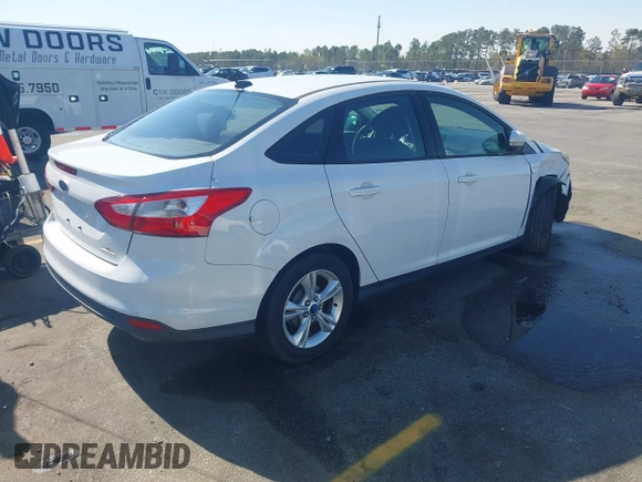 2013 Ford Focus SE with VIN 1FADP3F25DL223541, listed as a IAAI auction lot 41877904 with 192,484 mi miles and . Bid and sale history available at DreamBid. Image 4.