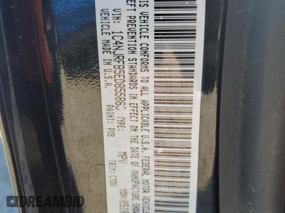 2014 Jeep Patriot Latitude with VIN 1C4NJRFB5ED855888, listed as a Copart auction lot 57969355 with 113,196 mi miles and Salvage title. Bid and sale history available at DreamBid. Image 12.
