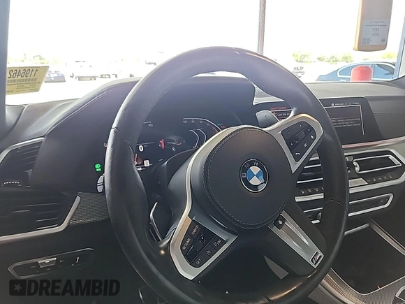 2023 BMW X5 xDrive40i with VIN 5UXCR6C00P9R65110, listed as a IAAI auction lot 42635441 with 32,227 mi miles and . Bid and sale history available at DreamBid. Image 7.