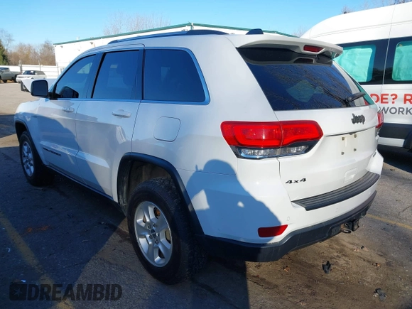 2017 Jeep Grand Cherokee Laredo with VIN 1C4RJFAGXHC756562, listed as a IAAI auction lot 40793476 with 102,241 mi miles and . Bid and sale history available at DreamBid. Image 3.