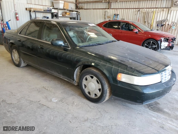 1999 Cadillac Seville Luxury SLS with VIN 1G6KS54Y5XU920020, listed as a Copart auction lot 53956115 with 104,096 mi miles and Clean Title. Bid and sale history available at carsss.com. Image 4.