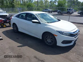 2017 Honda Civic LX z VIN 19XFC2F58HE041284, wystawiony jako IAAI lot #42266869 z przebiegiem 243 612 mil mil oraz . Historia ofert i sprzedaży dostępna na DreamBid. Obrazek 1.